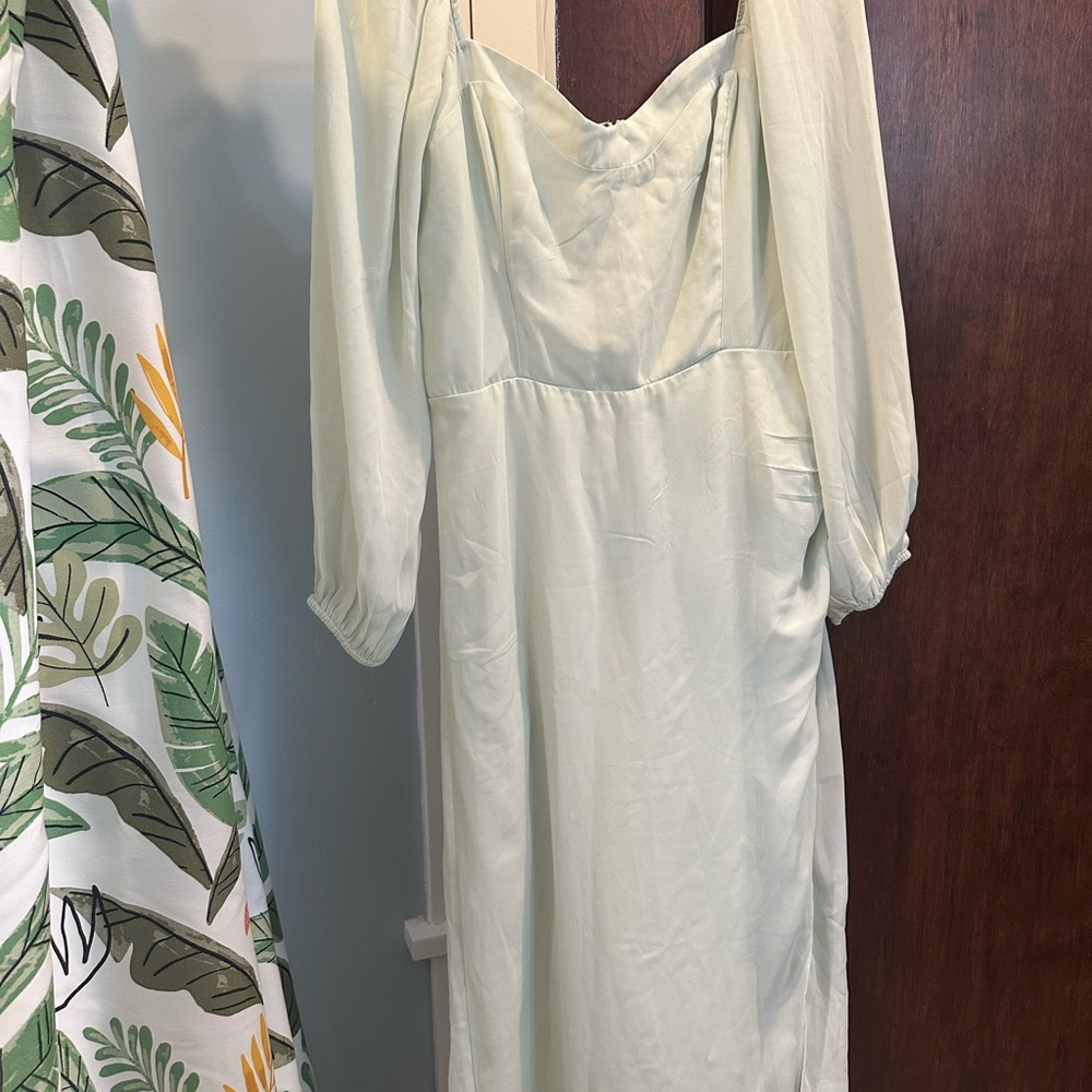 Elegant mint colored dress. Never worn. Removed original tags.